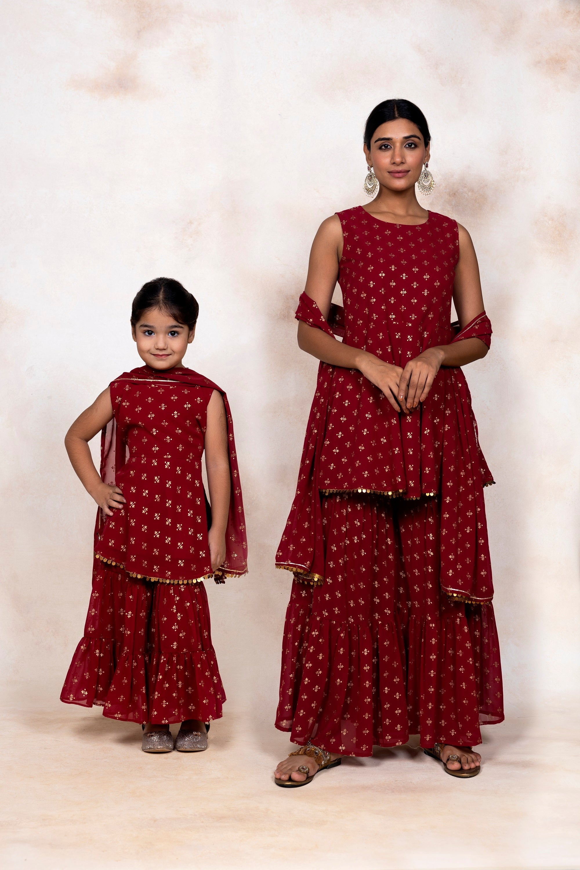 Maroon & Gold Foil Print Girls Peplum style Sharara Set With Dupatta