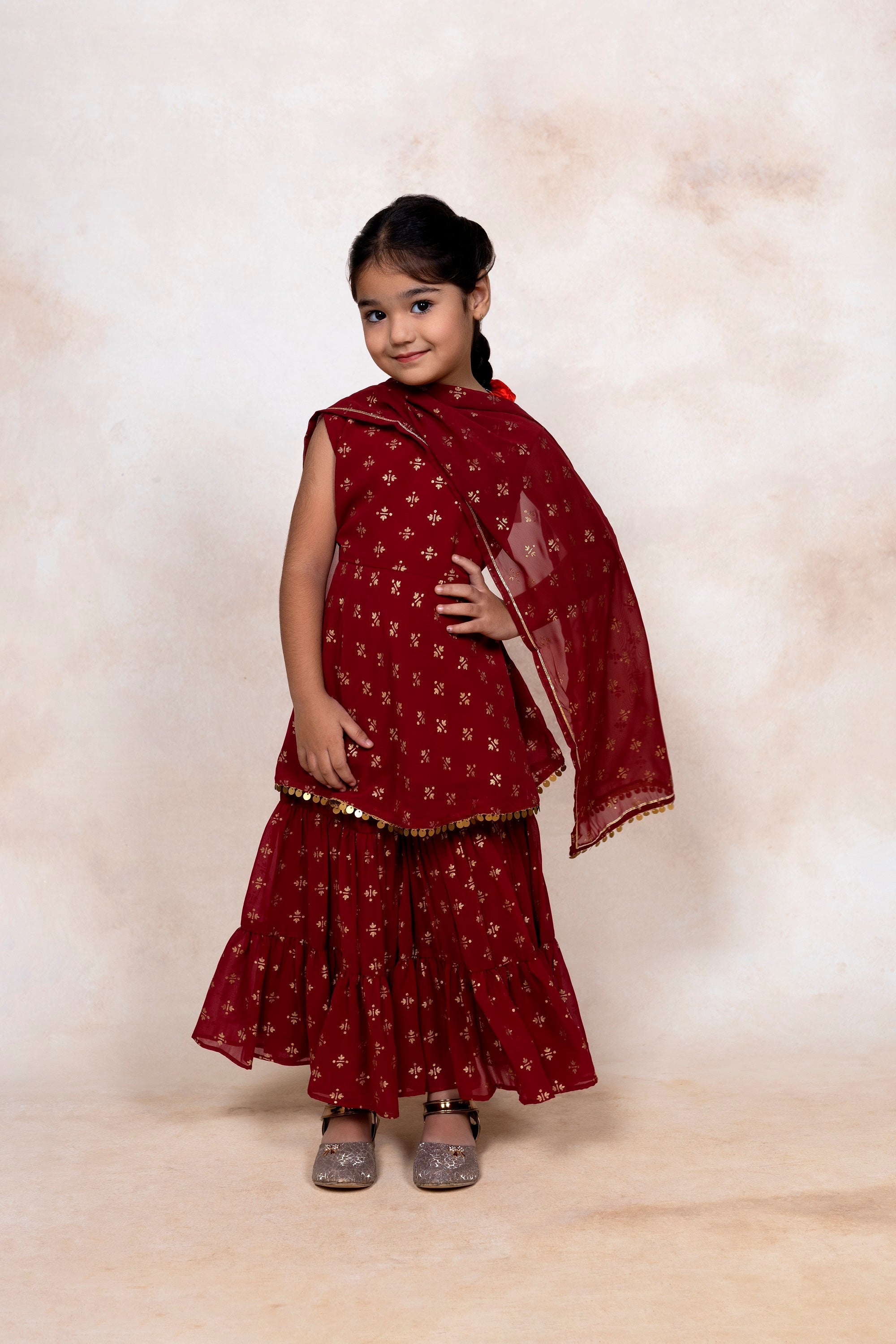 Maroon & Gold Foil Print Girls Peplum style Sharara Set With Dupatta