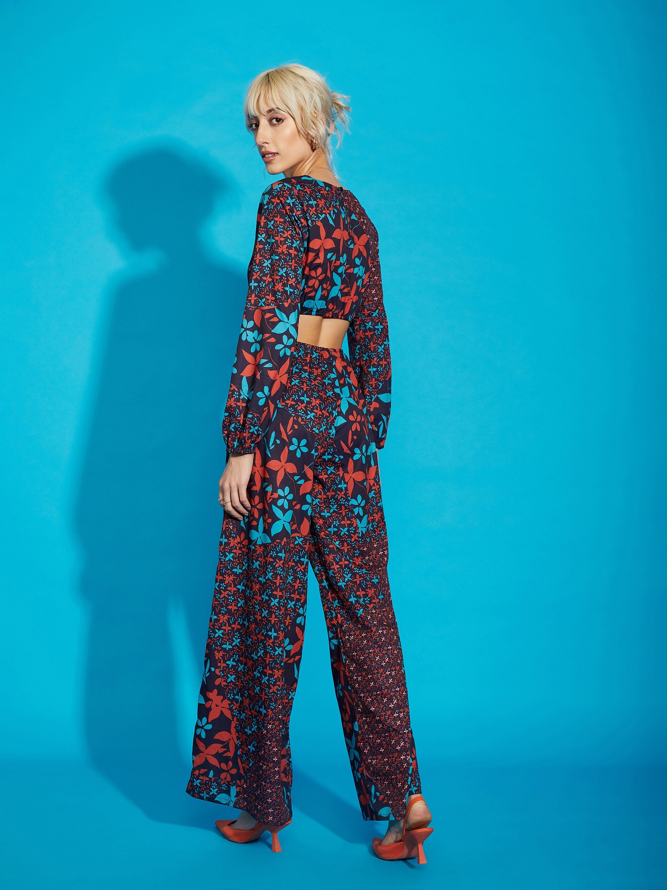 Women Navy Floral Twisted Waist Cut Out Jumpsuit