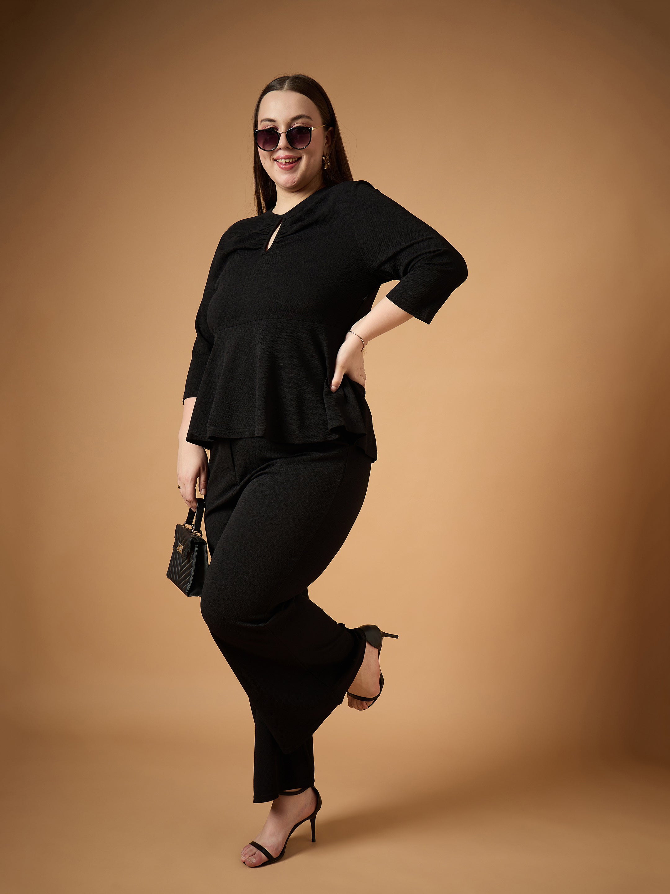 Women Black Keyhole Top With Bell Bottom Pants