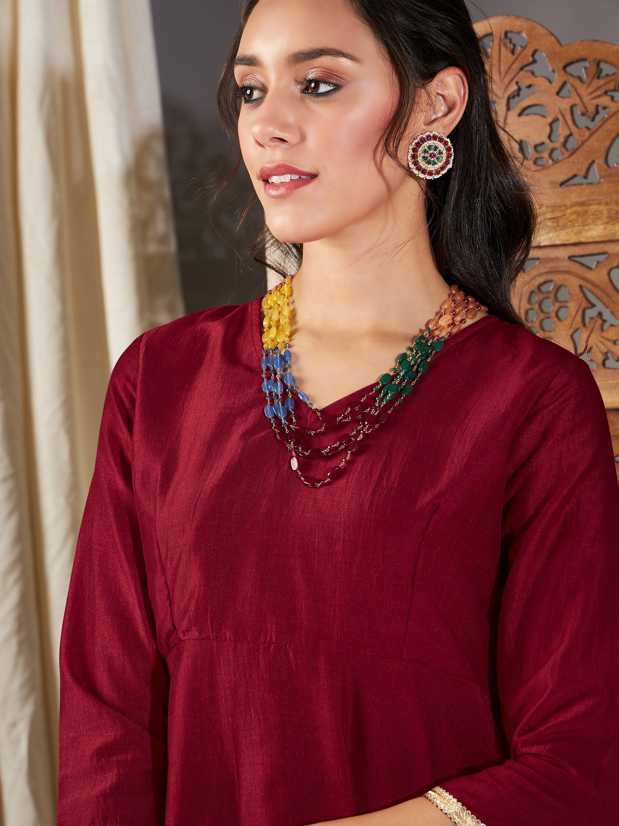 Women Maroon Zari Embroidered Peplum Top