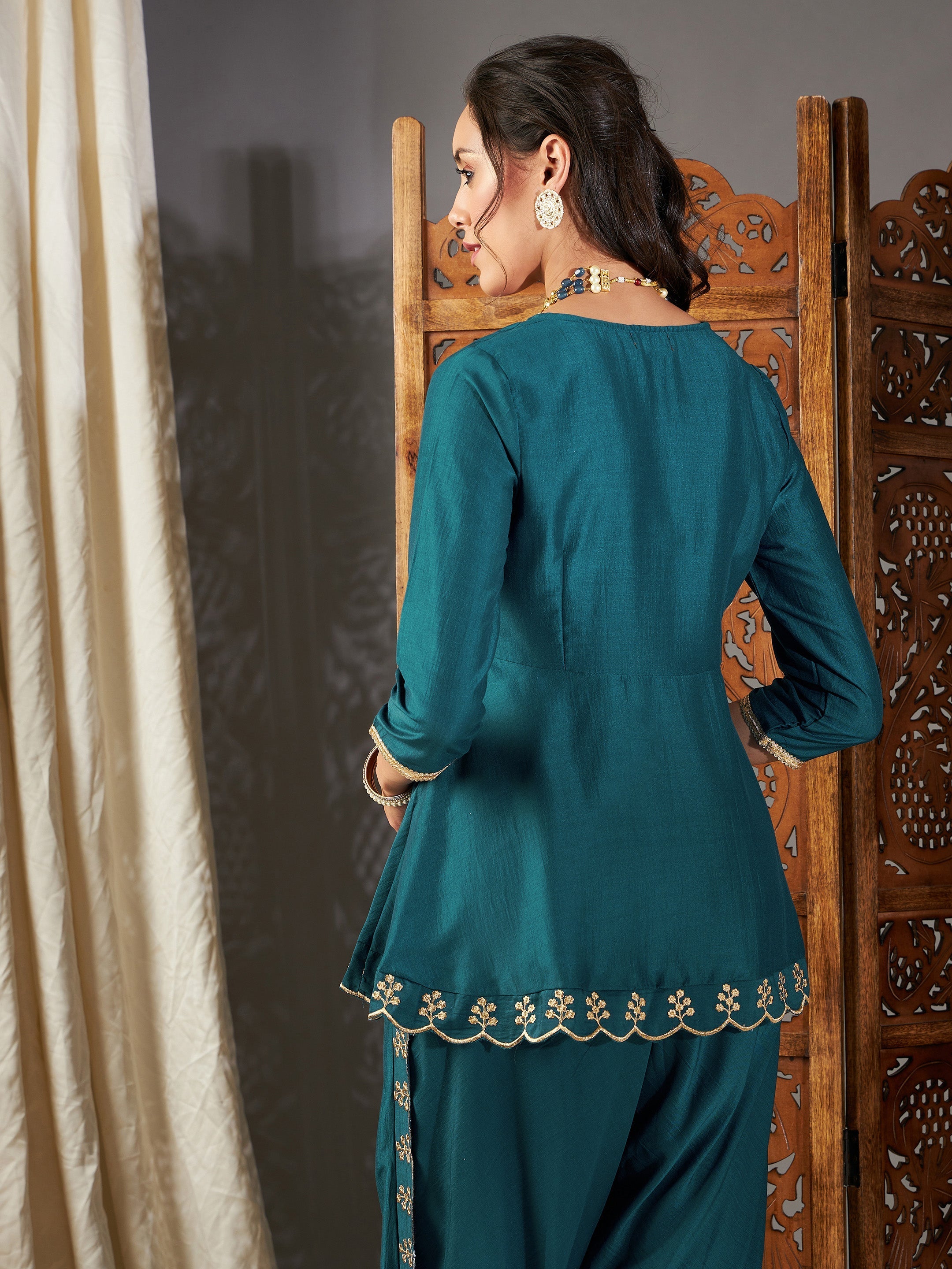 Women Teal Zari Embroidered Peplum Top