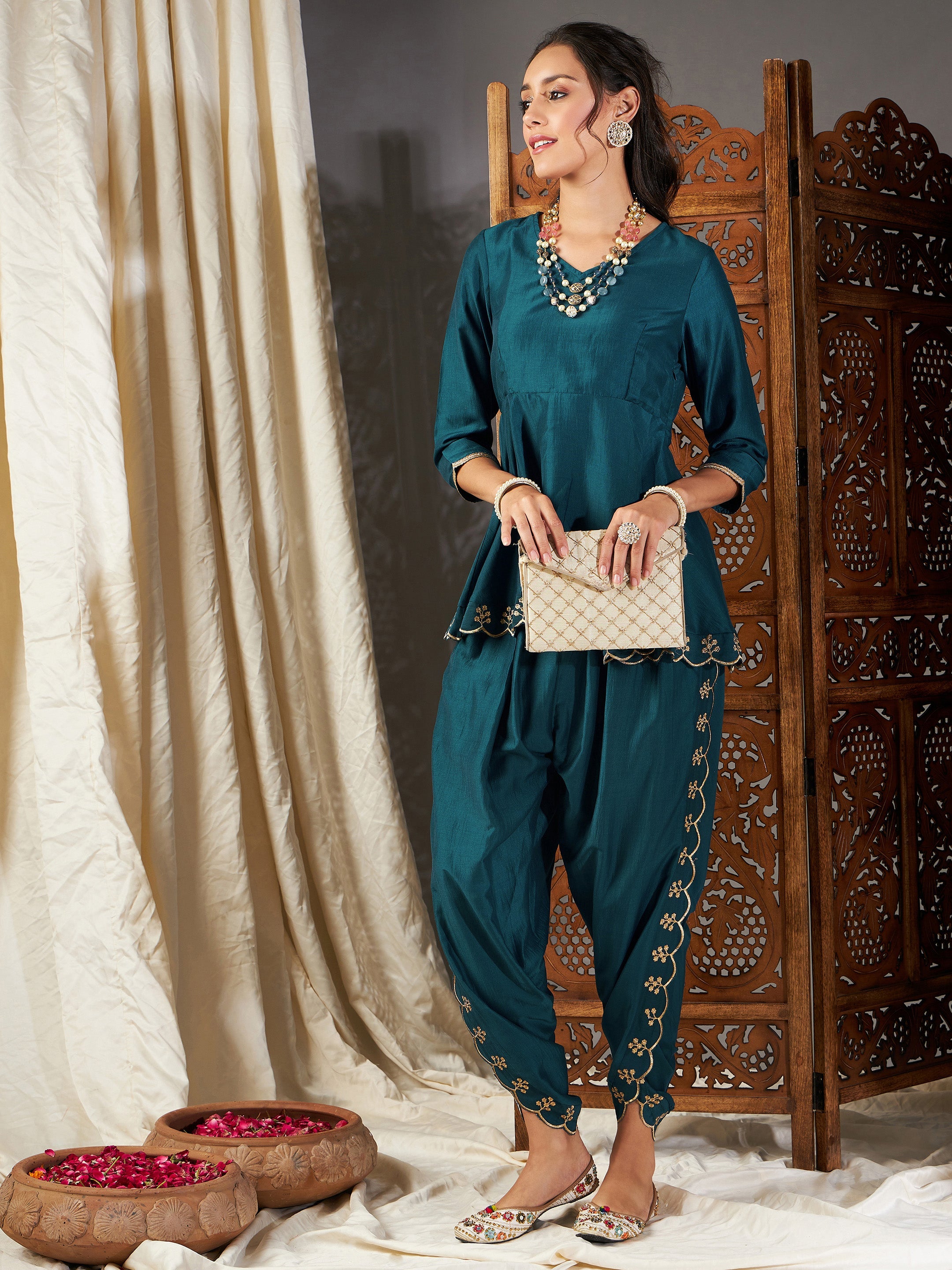 Women Teal Zari Embroidered Peplum Top