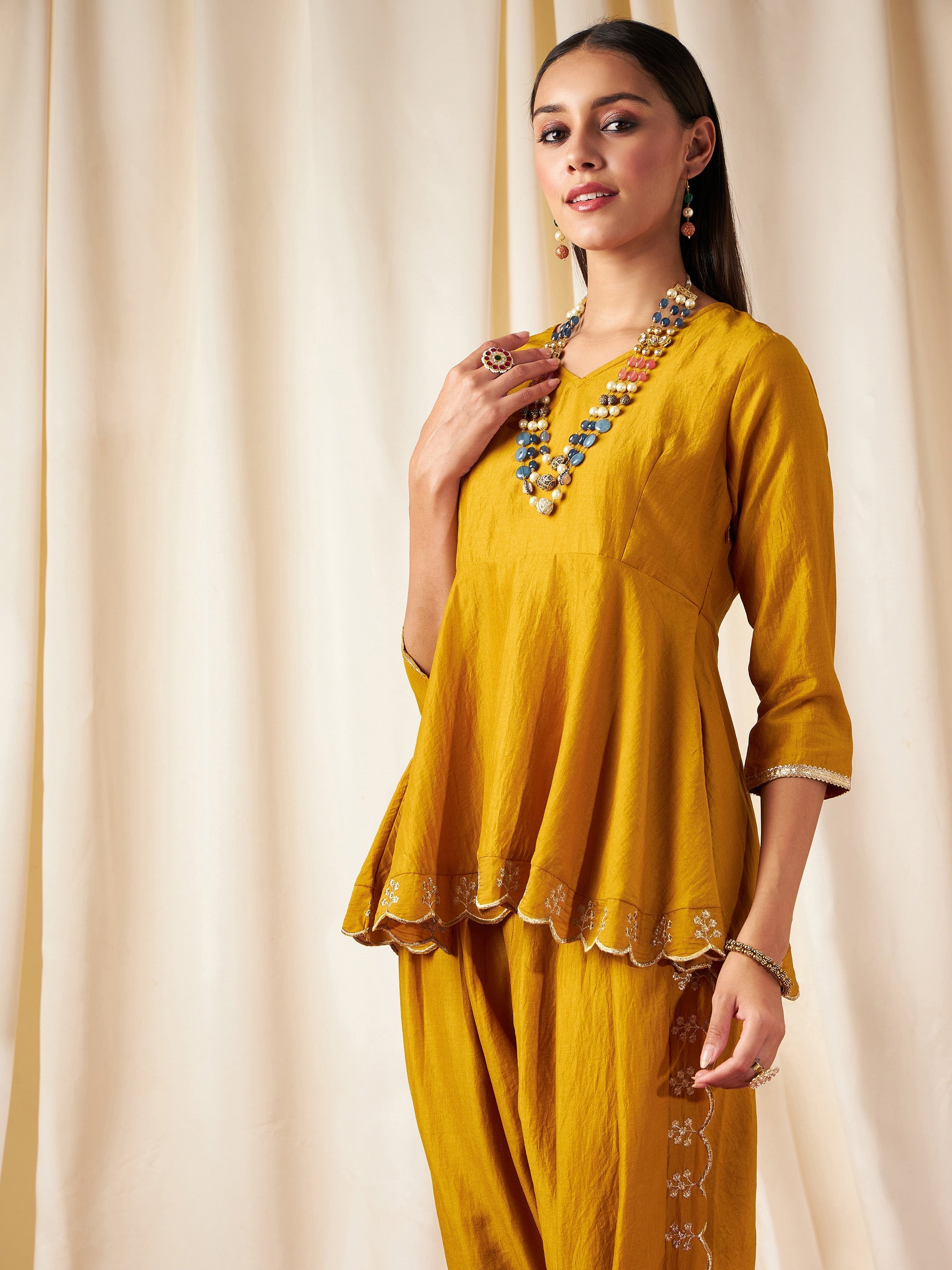 Women Mustard Zari Embroidered Peplum Top